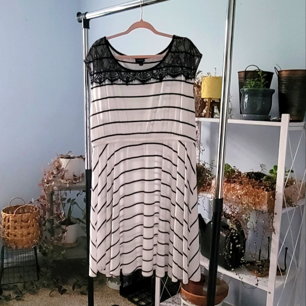 Torrid Stripe with eyelash lace accent neckline. Size 2